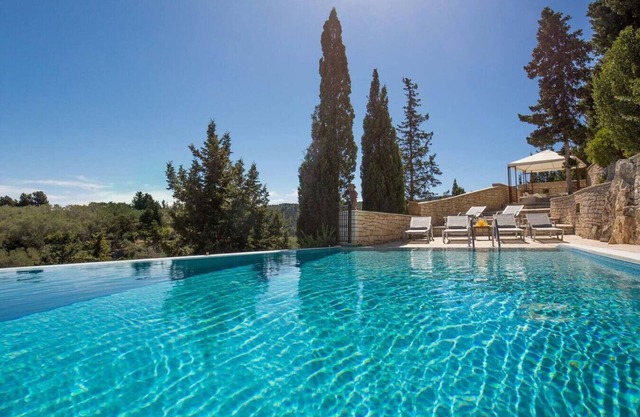 Infinity pool villa with panoramic sea views