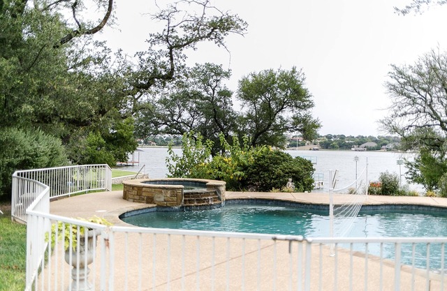 Kick off Summer at this private home & pool ON Lake Granbury!
