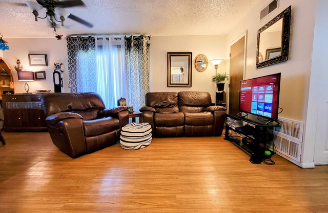*King adjustable bed, massage chair, one level near KU, affordable luxury