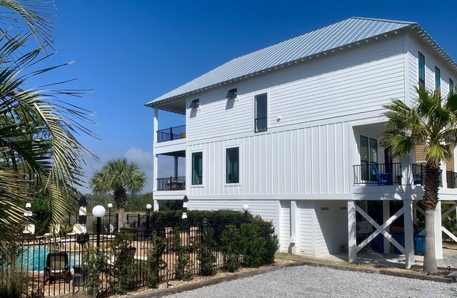 “Lagoonfront Privacy at its Best: Heated Pool, Hot Tub, & Kayaks Included”