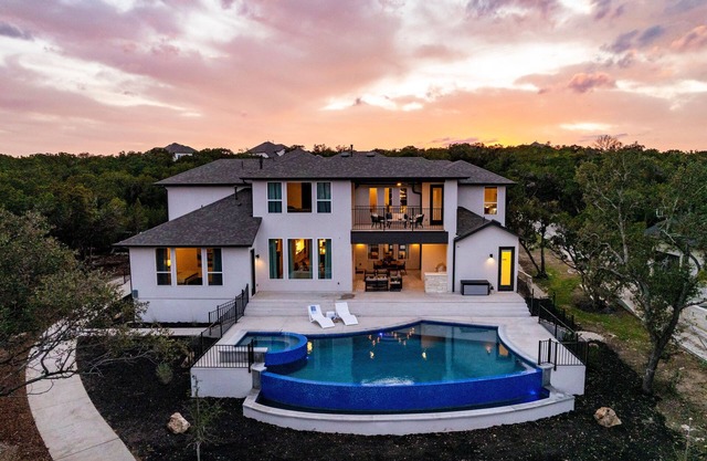 Lakefront Luxury: 5,000 Sq Ft Retreat with Pool, Spa & Private Dock