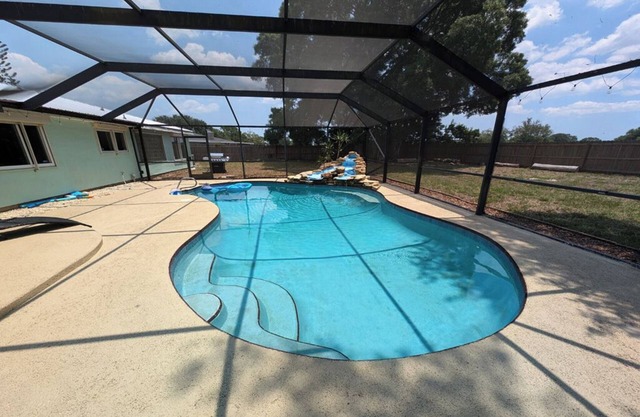 Large 4bd 2bth pool home with waterfall feature and private back yard!