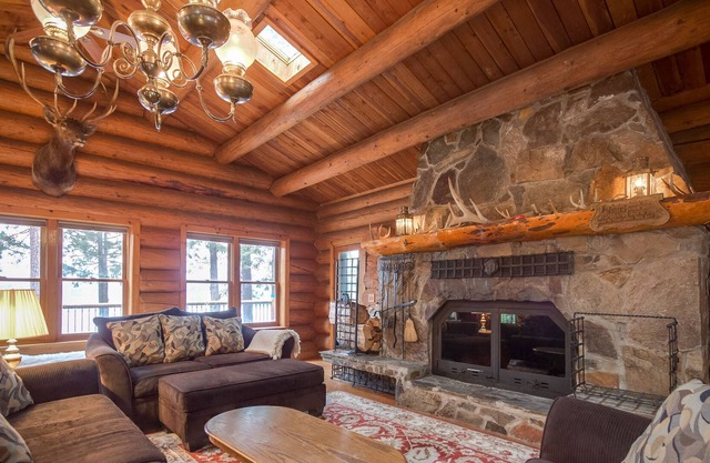 Large lakefront cabin with pool table, private hot tub, & dock