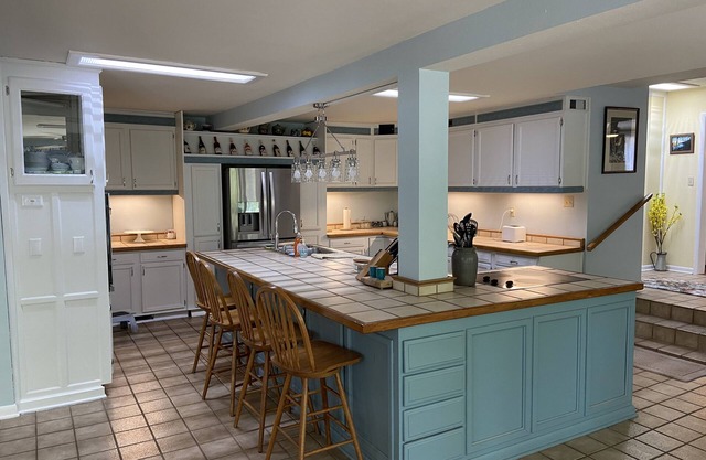 Large unique home in the beautiful Ozark Mountains on the Kings River.