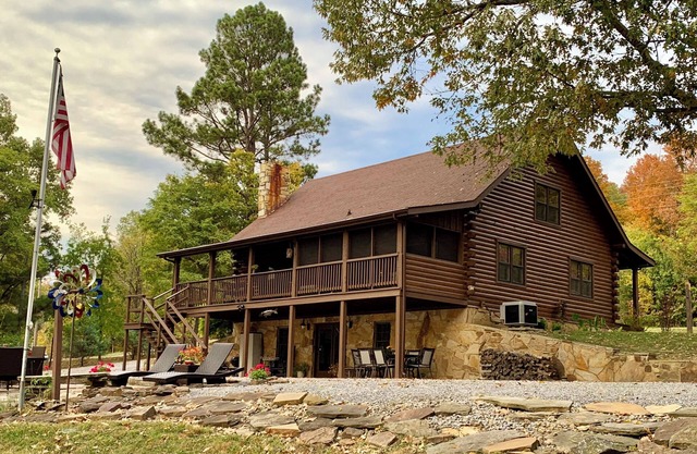 Log cabin with walkout basement and loft located on Ohio River’s edge.