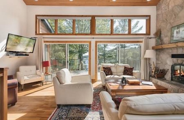 Log home & guest cottage in old forest, Waterfall, Sunsets, Sauna, Fishing Boat