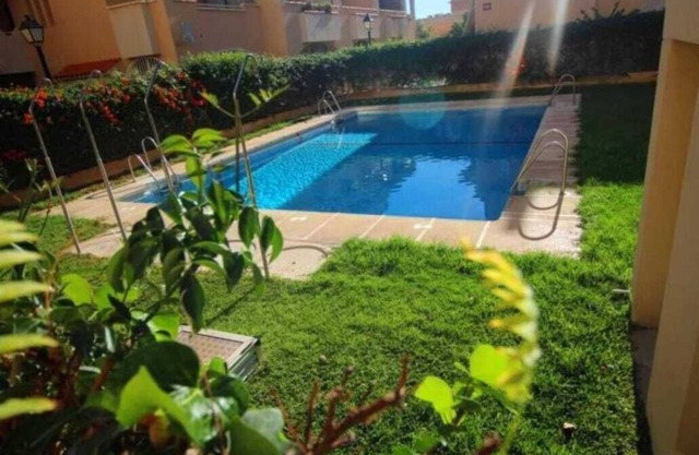 Lovely apartment with terrace and swimming pool close to the beach.Parking space