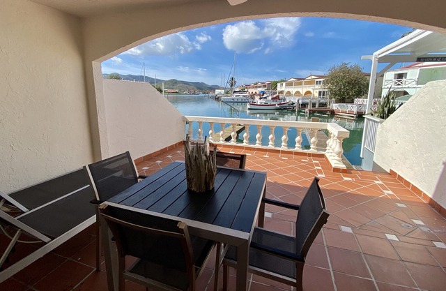 Lovely Two-bedroom Waterfront Villa Located In Jolly Harbour