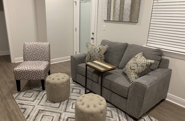 Luxurious 2nd floor midtown apartment with balcony.