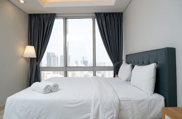 Luxury 2BR at The Empyreal Condominium Epicentrum Apartment