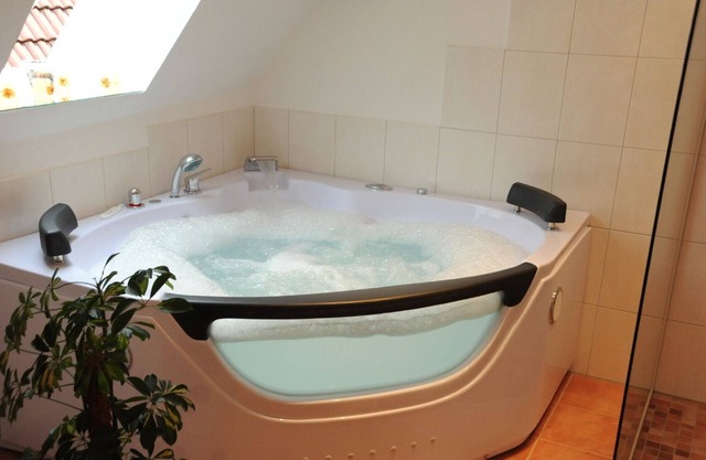Luxury apartment with its own whirlpool & fireplace / use of the wellness area incl.