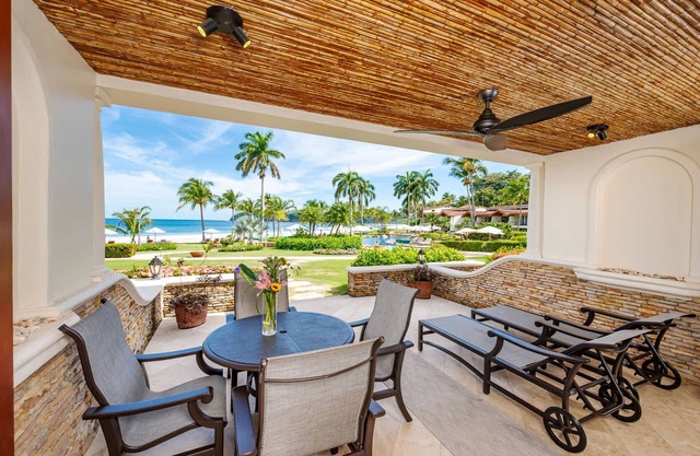 Luxury Beachfront Condo w/High-End Wood Furnishings and Ocean Views in Exclusiv