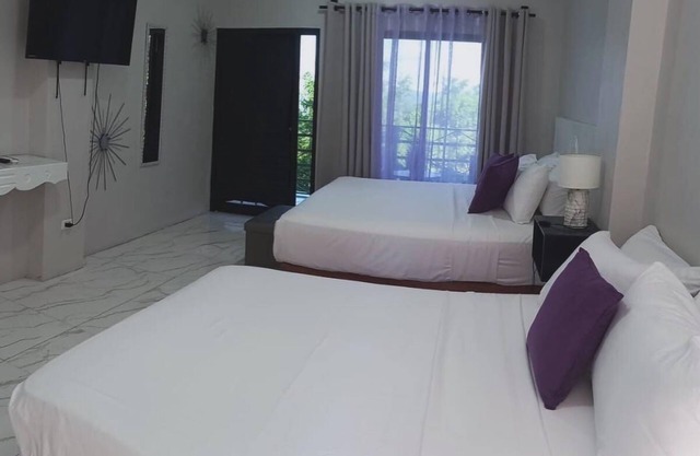 Luxury havens with two kings or a king and queen bed, overlooking Port Antonio