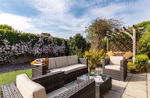 Luxury modern house on the edge of the Village, close to Beach and Golf-course.