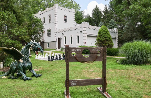 Luxury POCONO CASTLE w/ESCAPE ROOM, Private Pond, Boats, Sauna & Hot Tub