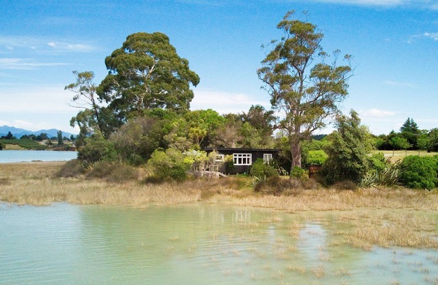 Miro Cottage. Sunny, private waterfront cottage with superb views.
