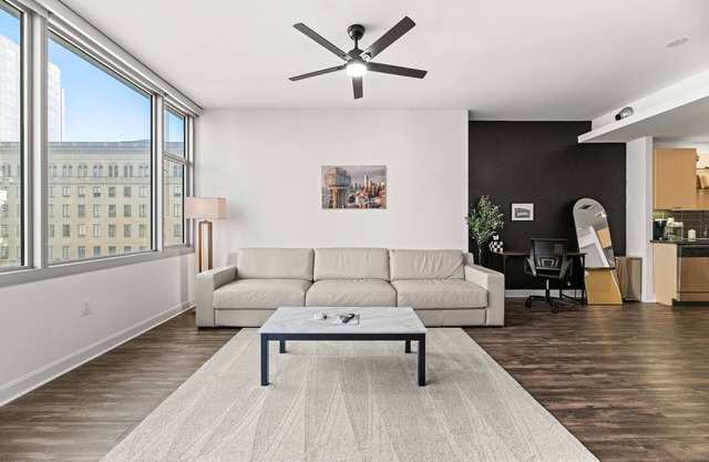 Modern 1-Bedroom City View High Rise Condo with Balcony Gym Pool Free Parking