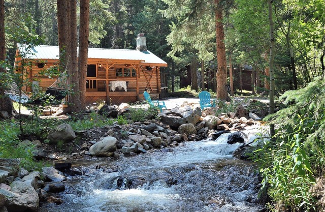 Modern Rustin Cabin with stream running through it!