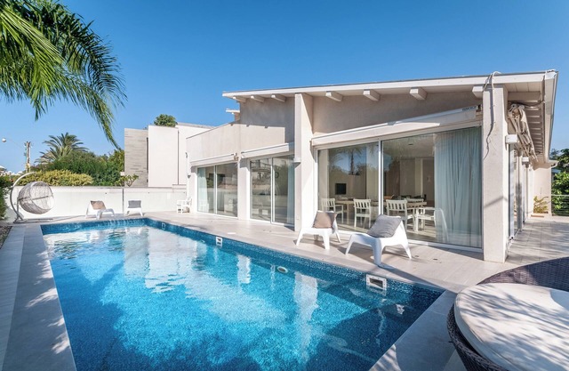 Modern Villa with pool next the Beach
