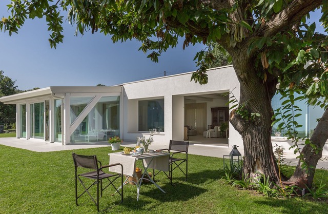 Modern villa with private garden, open countryside & sea view
