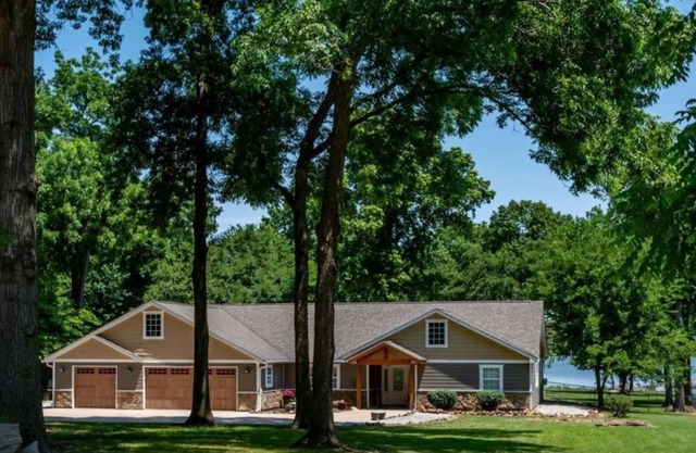Monkey Island waterfront w/ private 2-slip dock, 250' shoreline, and hot tub