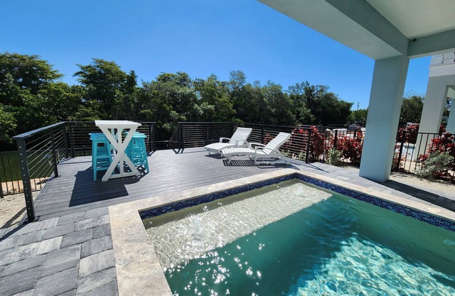 NEW! Saltwater Serenity .08 Miles to AMI, Canal Front w/Heated Pool!
