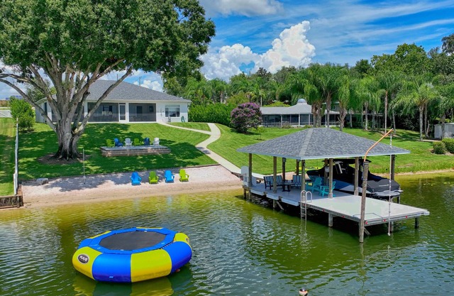 Newer Home on Lake June with Beach, Dock, Screened Patio and Hot Tub!