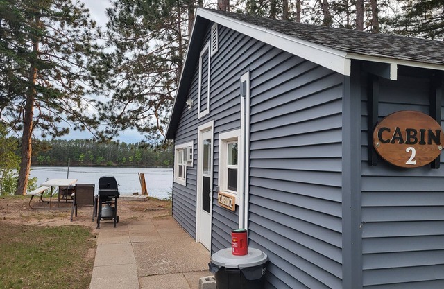 NEWLY RENOVATED from top to bottom. Northwoods cabin on the shores of Somo Lake