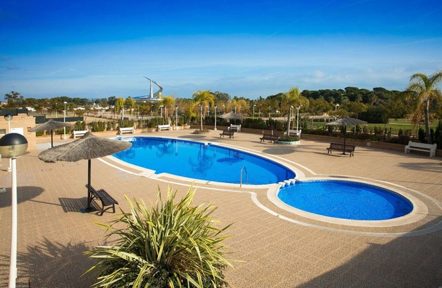 Nice apartment with A/C, WIFI, pool, TV, terrace, pets allowed, panoramic view and parking