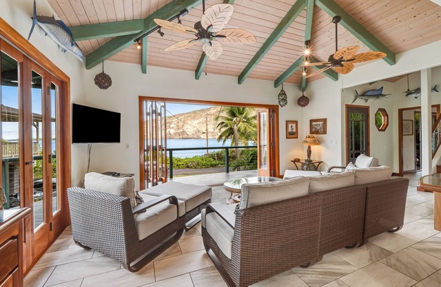 Oceanfront sanctuary with light-filled interior, lanai, W/D, & full kitchen