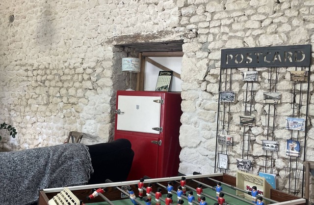 Old restored wine storehouse between sea and forest