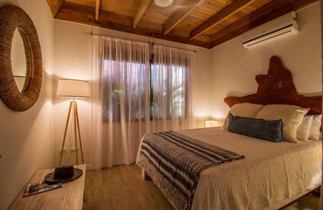 Only steps to the surf and a short walk to yoga, this modern casita sleeps 6.
