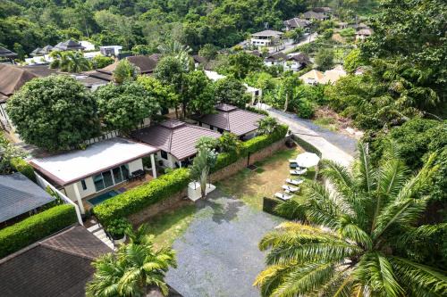 Oxavia Garden Oasis in Nai Harn - Your Private Tropical Garden with 3 Cabins and Jacuzzi