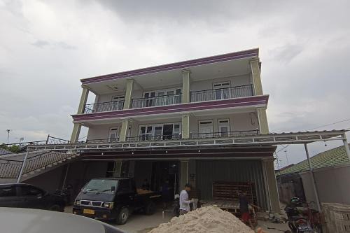 OYO 93520 Wisma Haji BunbunNearYani Heahlerr