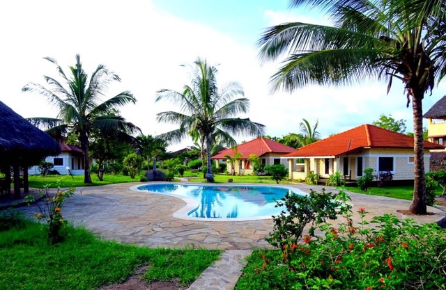 Perfect pool view and beach relaxation at Diani.