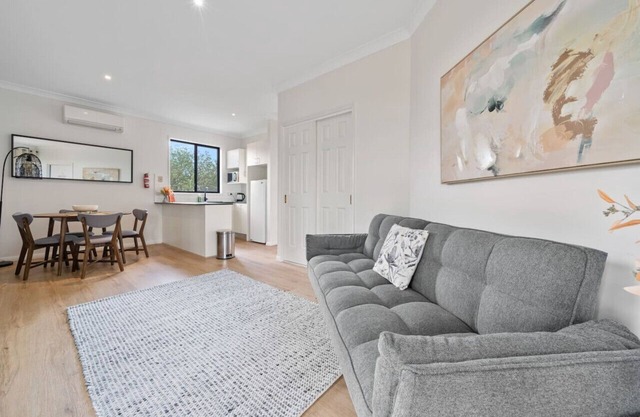 Perfectly Located Queen Room with Living Space