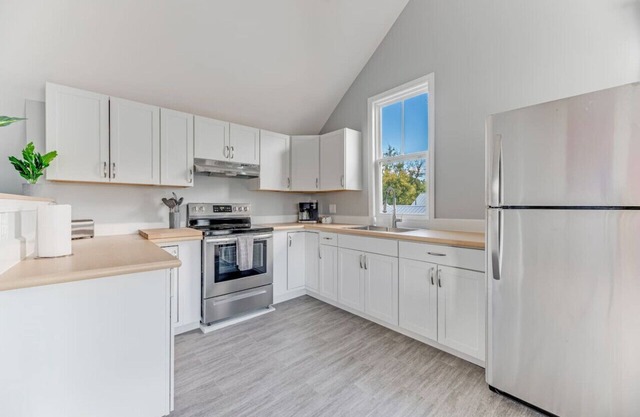 Picturesque Riverfront | 4 BD | Parking Provided