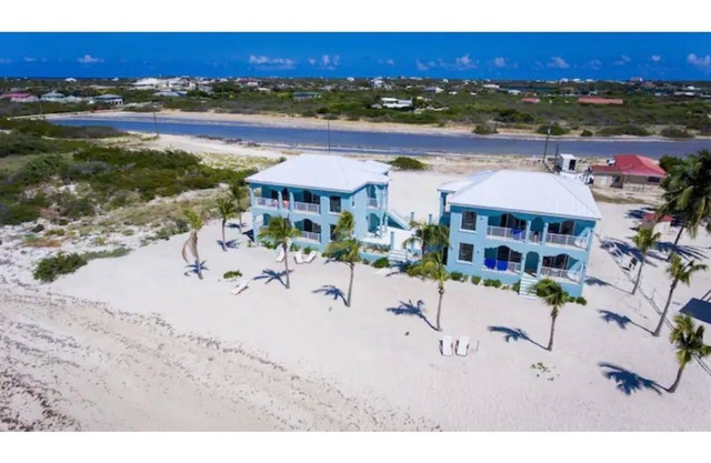 Pillory Club: Beachfront Condo with Water Sports and Excursions