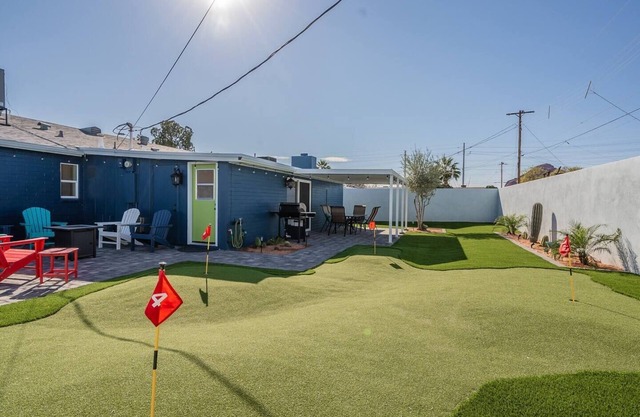 Play on the putting green, and enjoy quality time at this amazing home