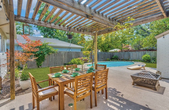 Prime location chic 4BR home with charming pool and yard