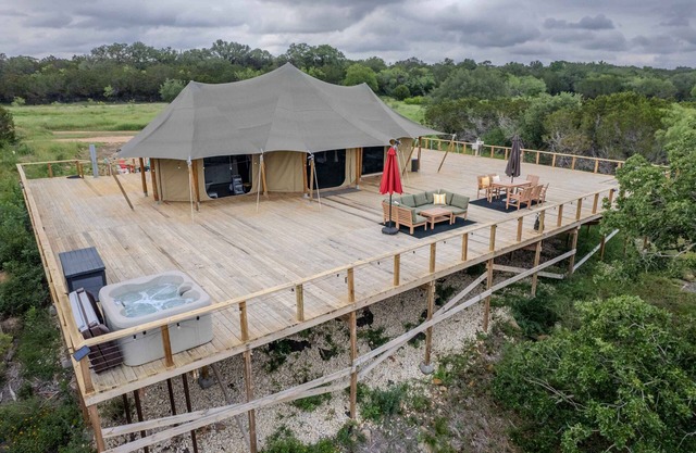 Private Outdoor Hot Tub with Stunning Mountain View Safari Tent Suite Glamping