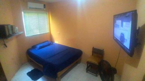 Private room with WiFi TV y Aire acondicionado