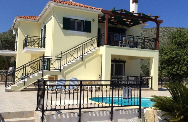 Private villa with pool, seconds from sandy beach!