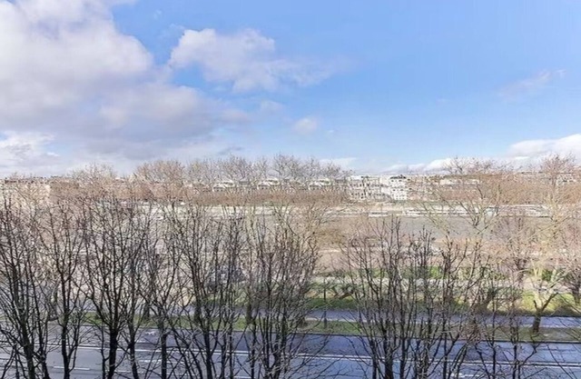 QUAI D'ORSAY(SEINE BELOW YOUR FEET)WITH MODERN, WARM & LUXURIOUS INTERIORS