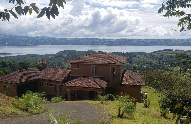 Relax in Jacuzzi with panoramic Views of Lake arenal after a day of adventure