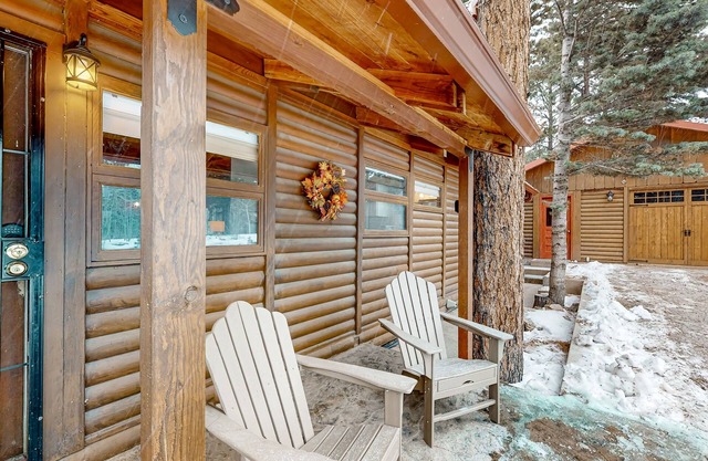 Remodeled wilderness retreat with game room, fireplaces, & deck
