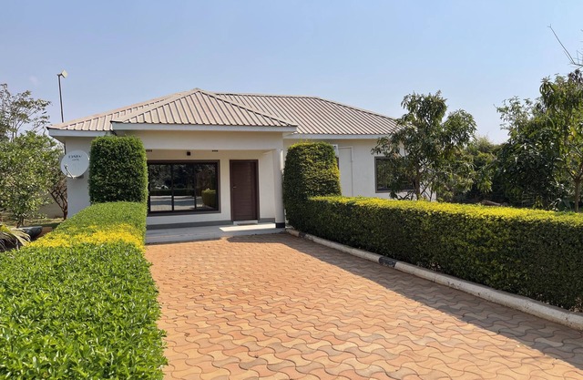 Remodelled guest house; with pool, gardens and 24/7 security!