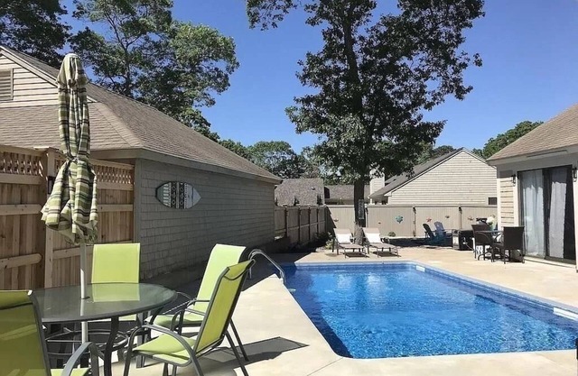 Renovated Home with heated pool near the beach! Fenced in yard +pet friendly