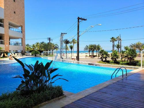 Resort-Beira-mar com piscina, ar-condicionado e 2 suítes