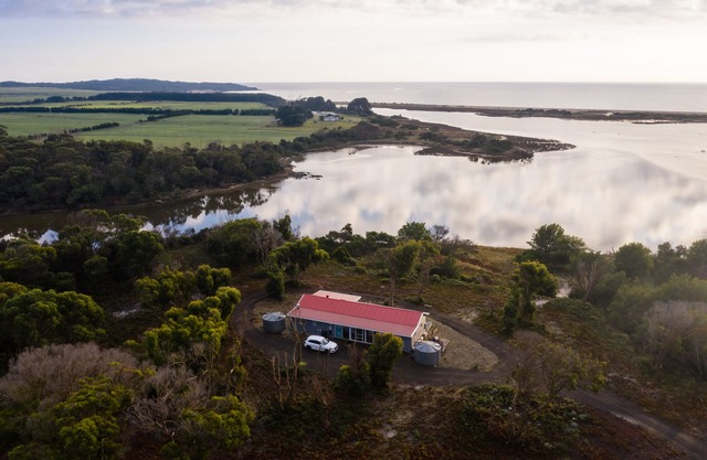 Riverfront Seclusion with Direct Access To Beach